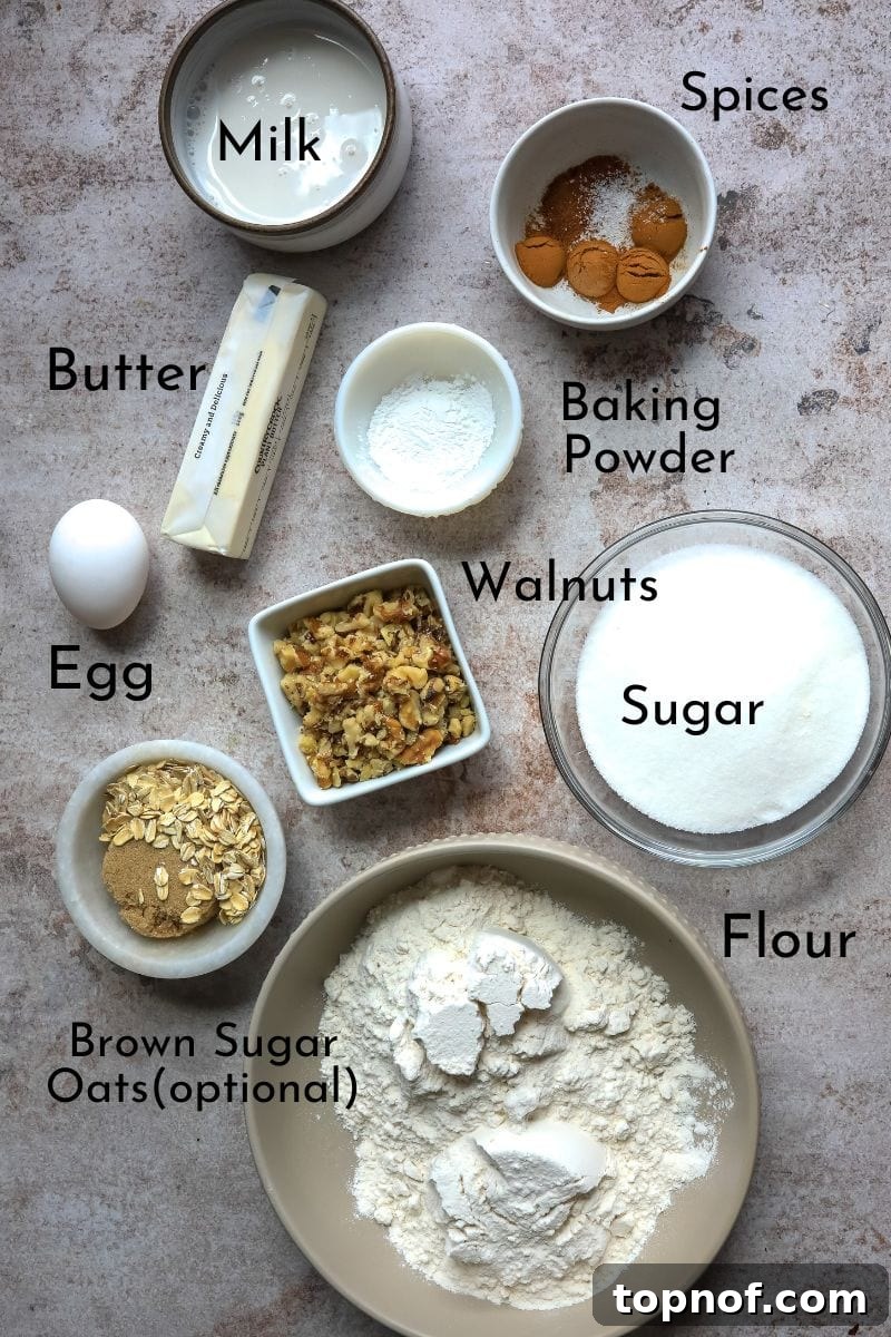 Bakery Style Cinnamon Muffins with Candied Walnuts 3 A vibrant collection of fresh ingredients laid out on a kitchen counter, ready to be transformed into delicious cinnamon muffins.