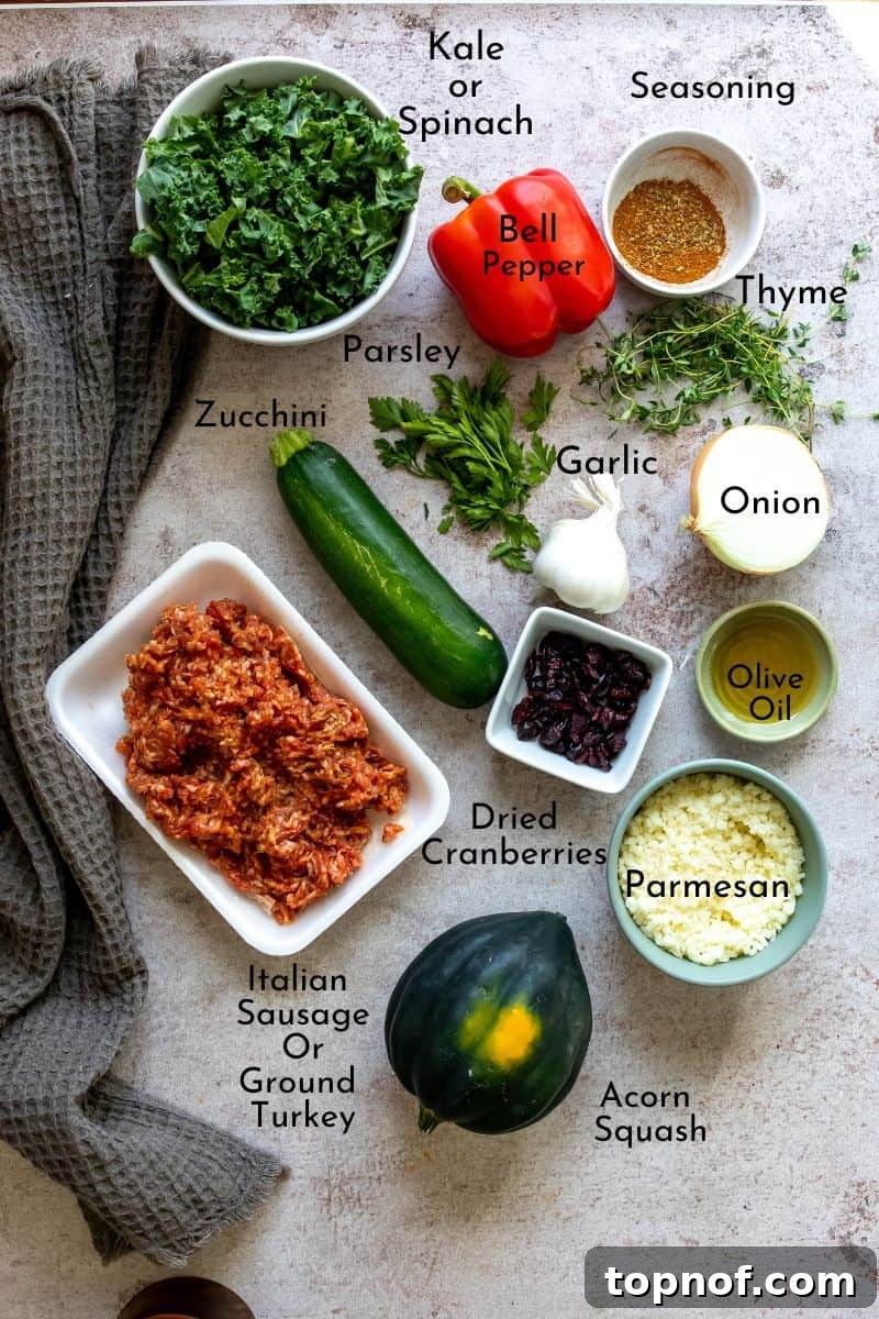 Hearty Sausage-Filled Acorn Squash 3 A colorful array of ingredients for sausage stuffed acorn squash laid out on a kitchen counter.