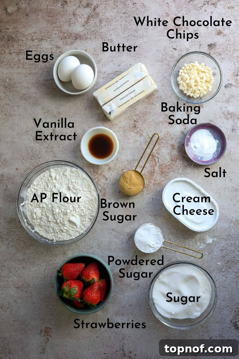 Decadent Strawberry Cheesecake Cookies 3 Bowls of ingredients needed to bake strawberry cheesecake cookies, neatly arranged on a kitchen counter.