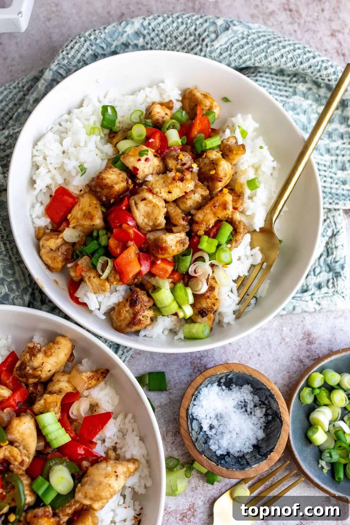 Crispy Salt and Pepper Chicken Bites 2 Crispy Chicken with salt and pepper seasonings served over rice with veggies.