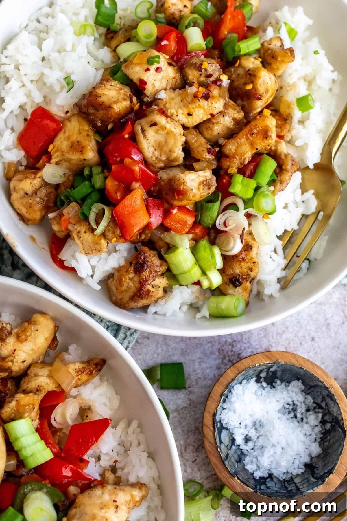 Crispy Salt and Pepper Chicken Bites 6 Crispy Chicken with salt and pepper seasonings. Up close in a white bowl.