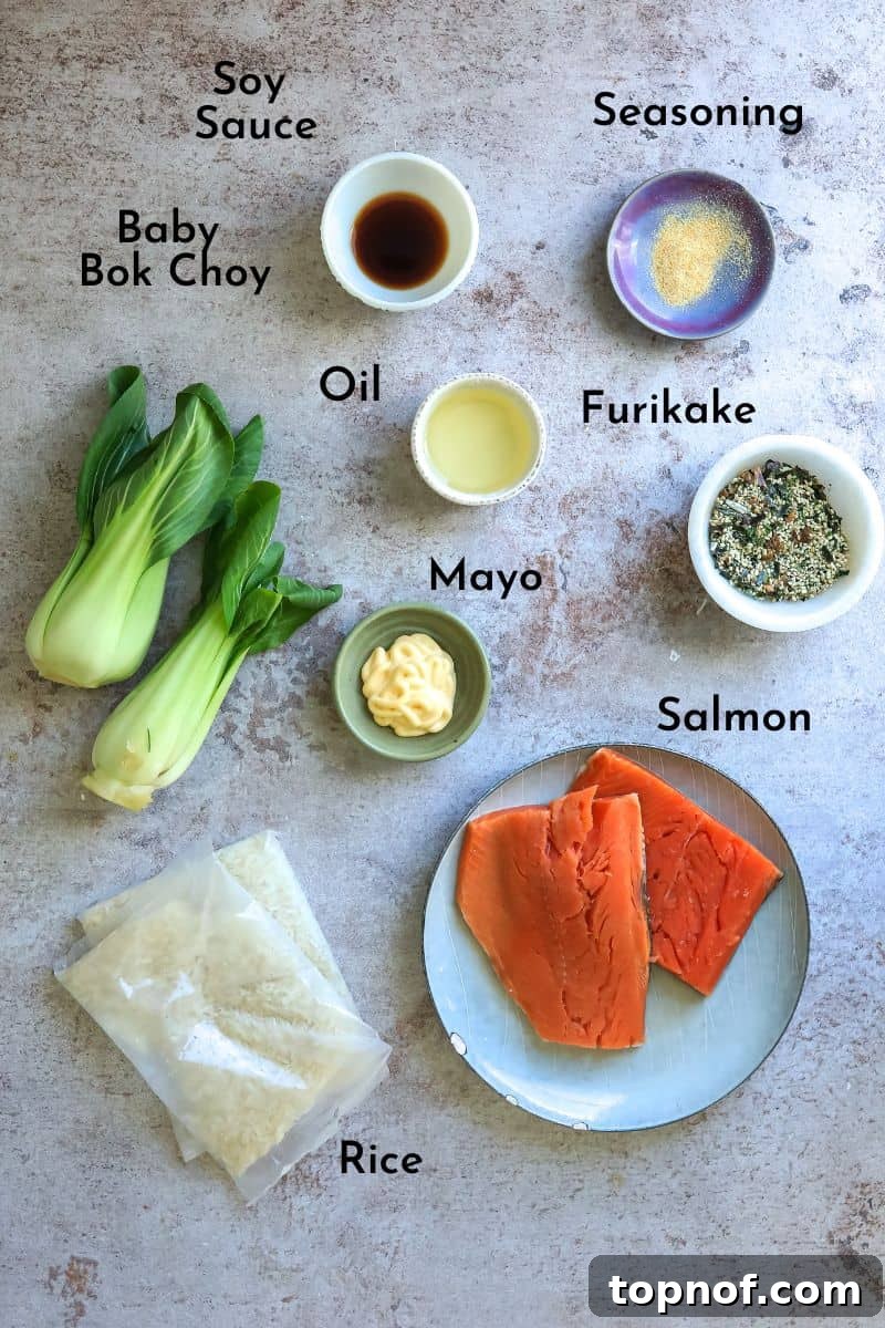 Savory Furikake Crusted Salmon 3 Ingredients laid out for Furikake Salmon preparation on a kitchen counter, showcasing small dishes of seasonings, mayo, and a salmon fillet.