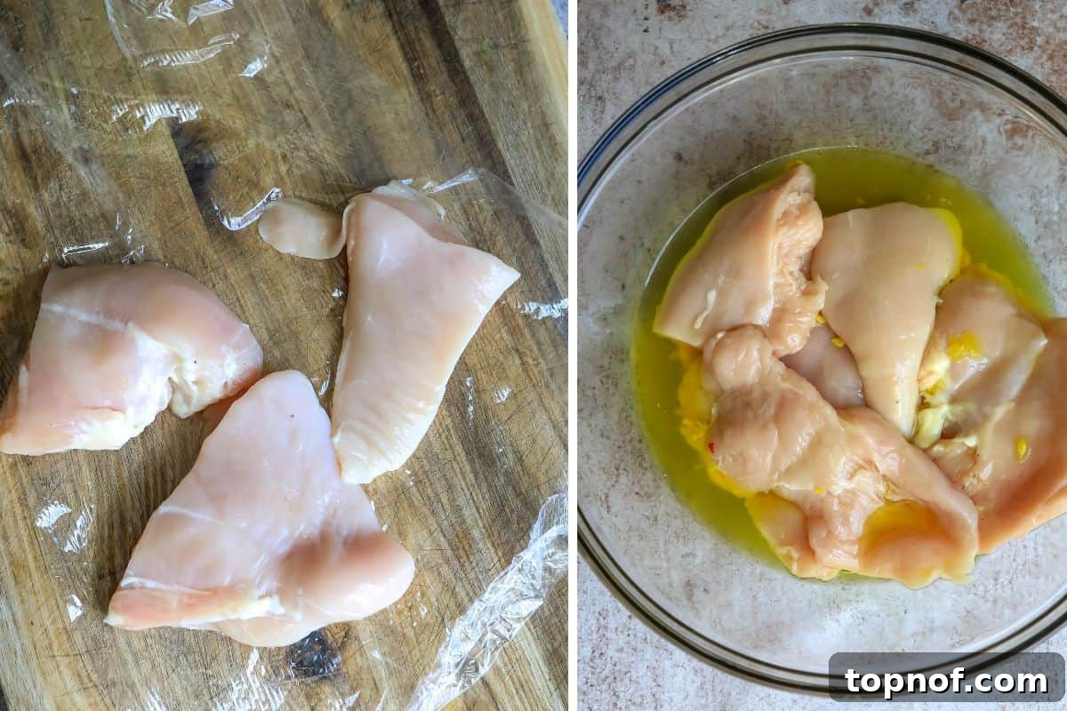 Golden Crispy Chicken Burger 4 Raw chicken breasts being tenderized under plastic wrap, next to a bowl of pickle juice.
