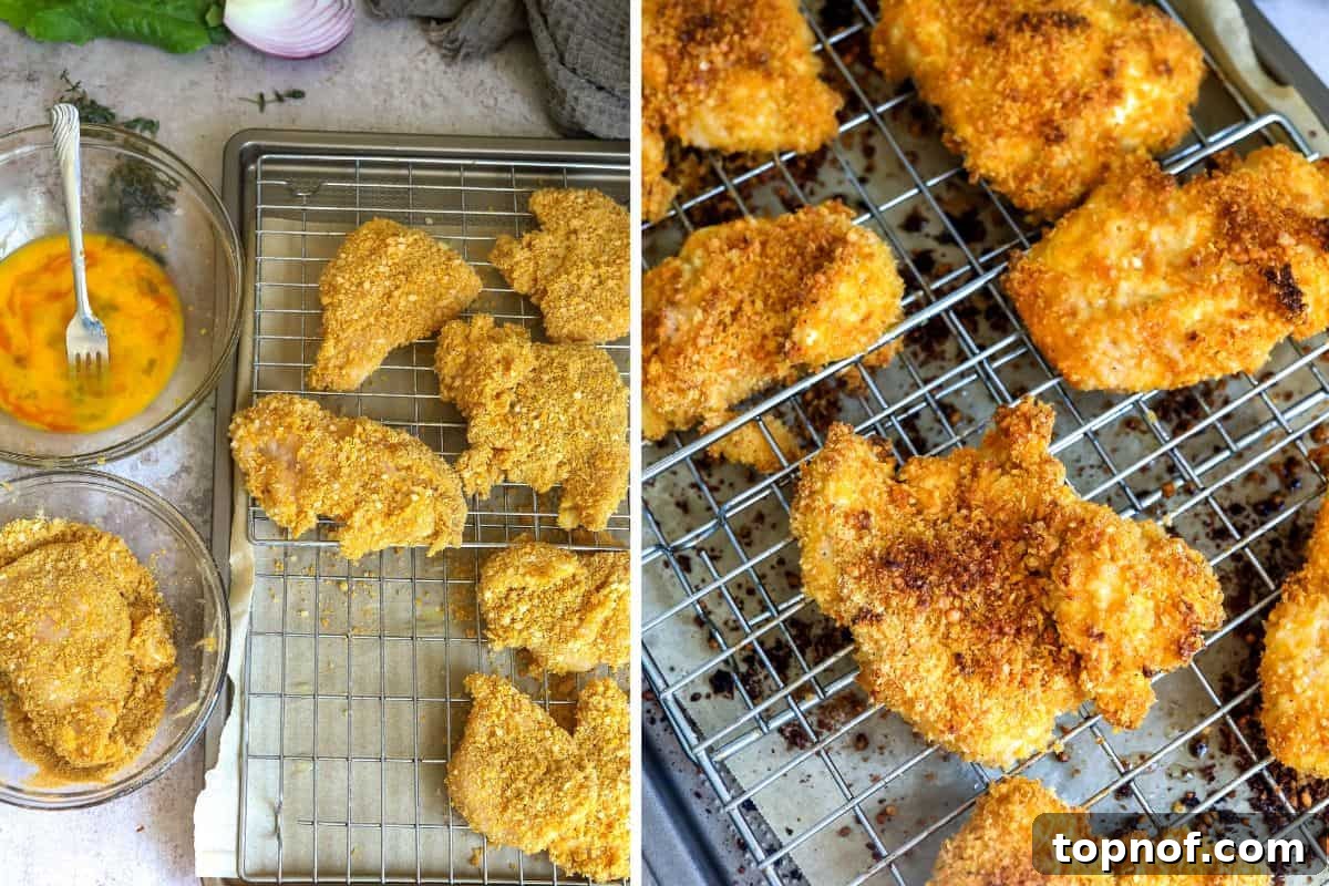 Golden Crispy Chicken Burger 5 Chicken pieces generously coated with cornflake mixture on a baking sheet, ready for the oven.