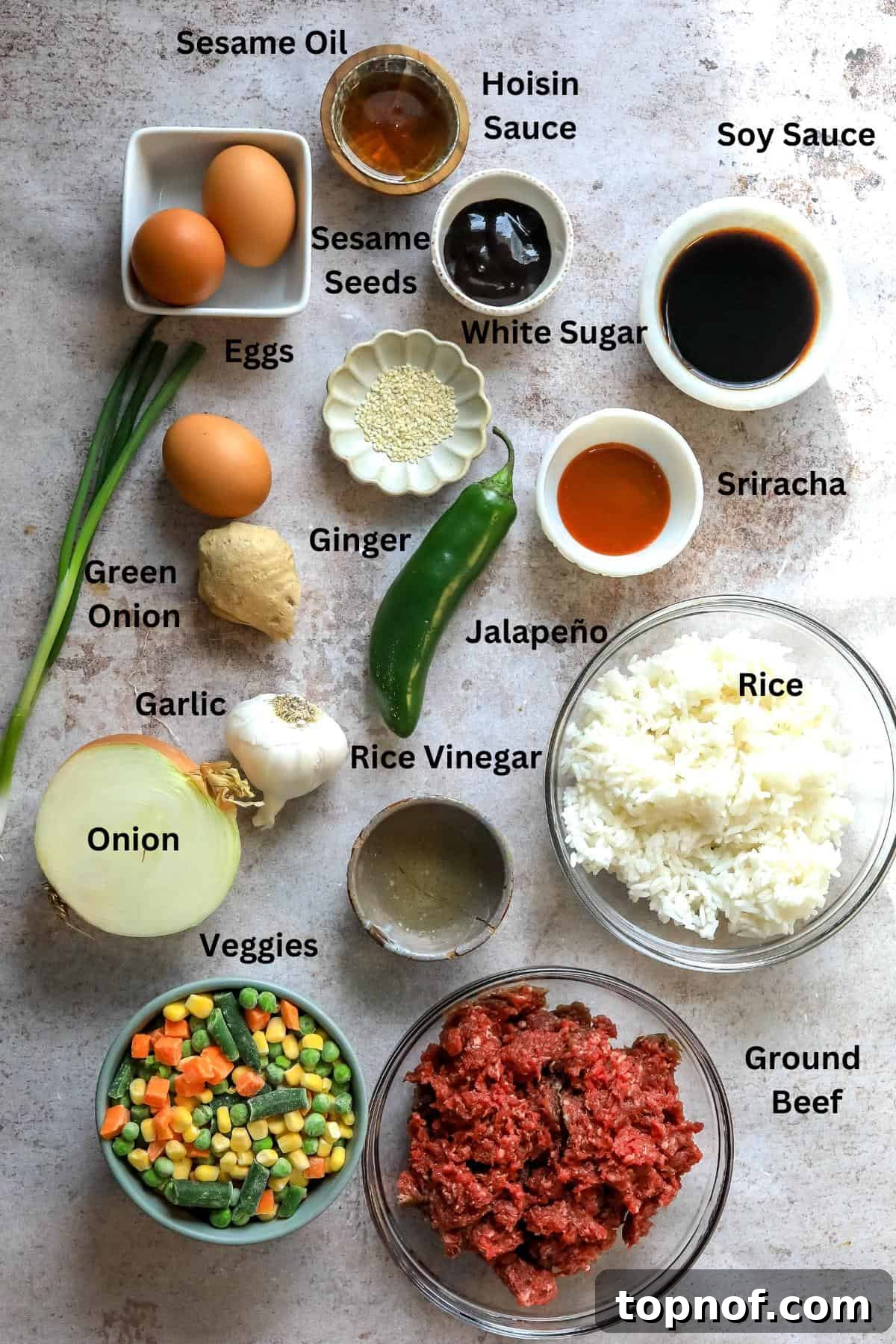 Sizzling Beef Fried Rice 3 Ingredients used to make this recipe on a counter before cooking.