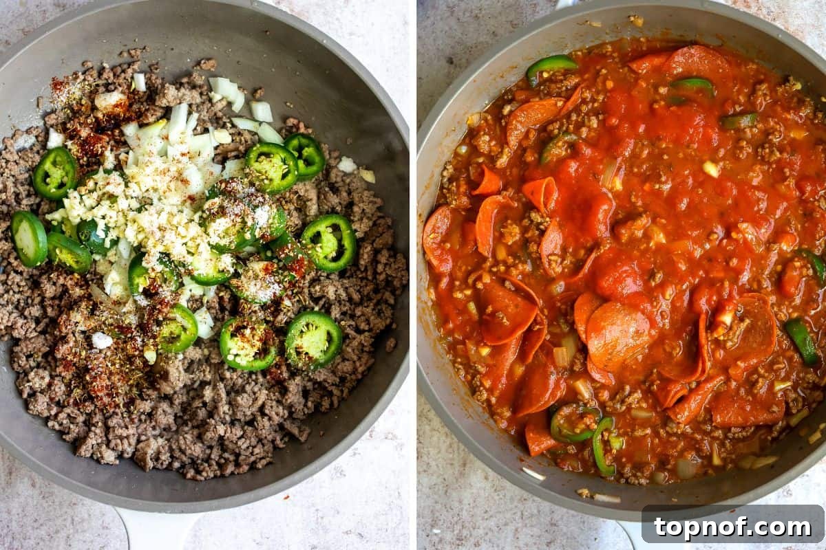 A large grey skillet on a stovetop, showing the initial steps of the recipe with browned ground meat, sautéed onions, jalapeños, and sliced pepperoni pieces mixing into the sauce.