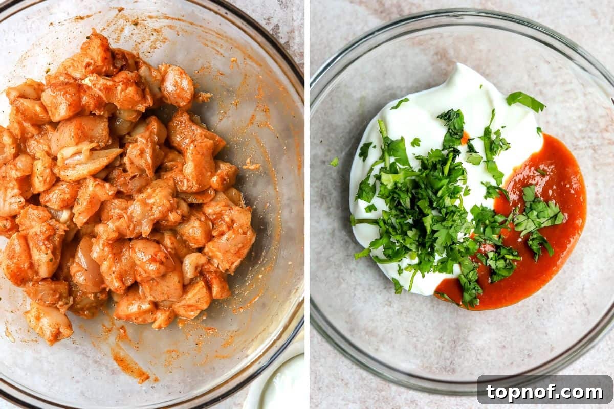 Diced chicken breast pieces in a glass bowl, mixed with lemon juice, olive oil, and a vibrant blend of Cajun spices, ensuring even coating.