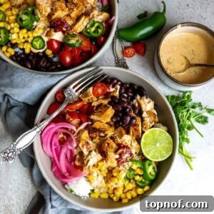 Bowls with a silver fork and chicken.