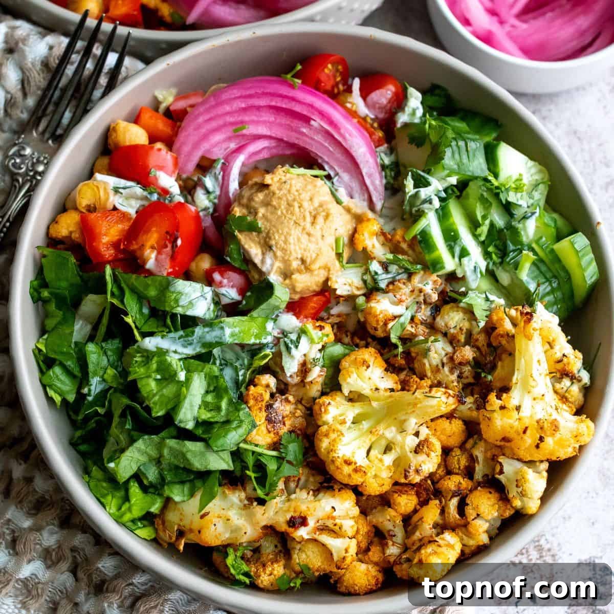 Plant Powered Shawarma 6 Veggie shawarma in a bowl up close with toppings.