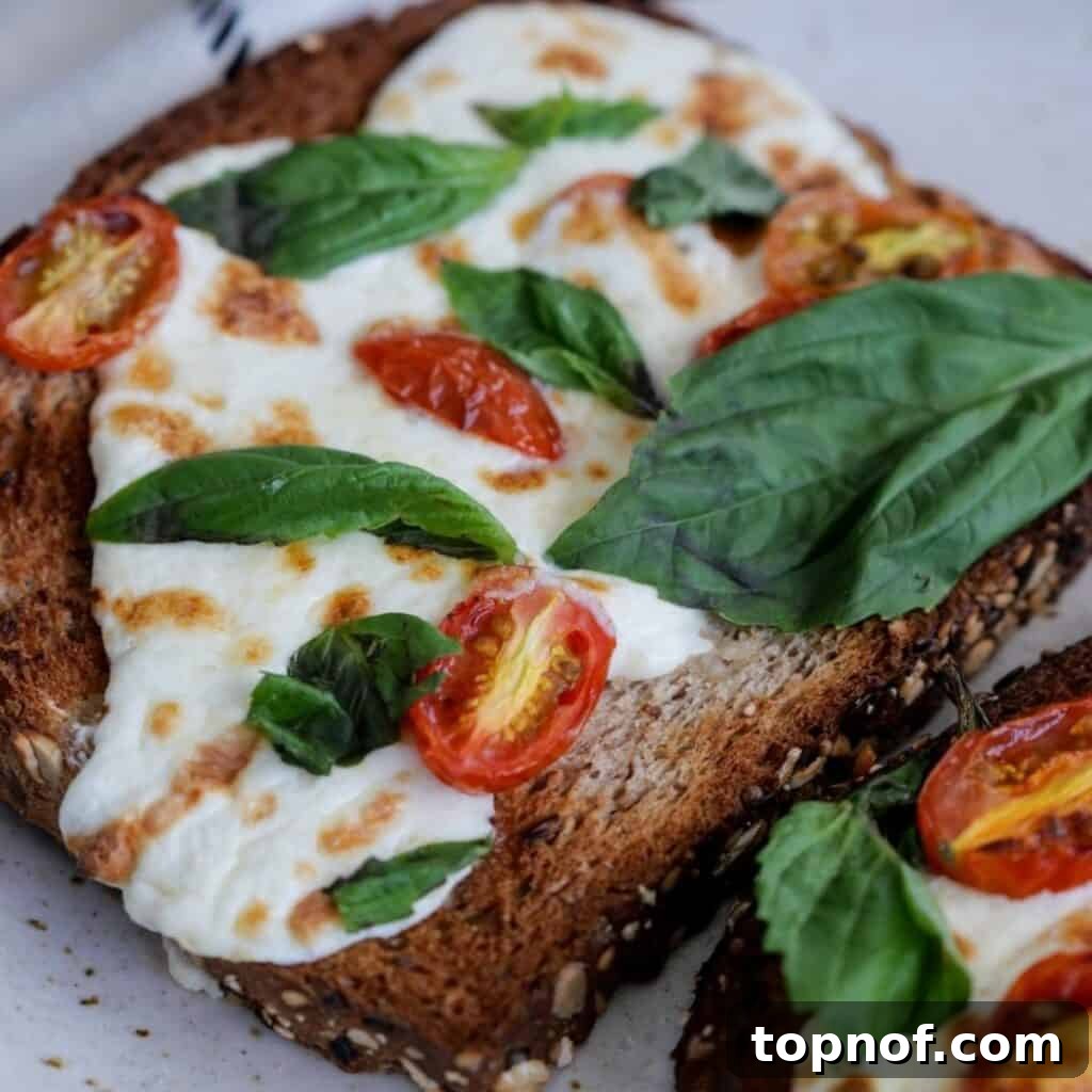 Ultimate Pizza Toastie 2 Delicious and easy pizza toast with melted cheese and fresh basil