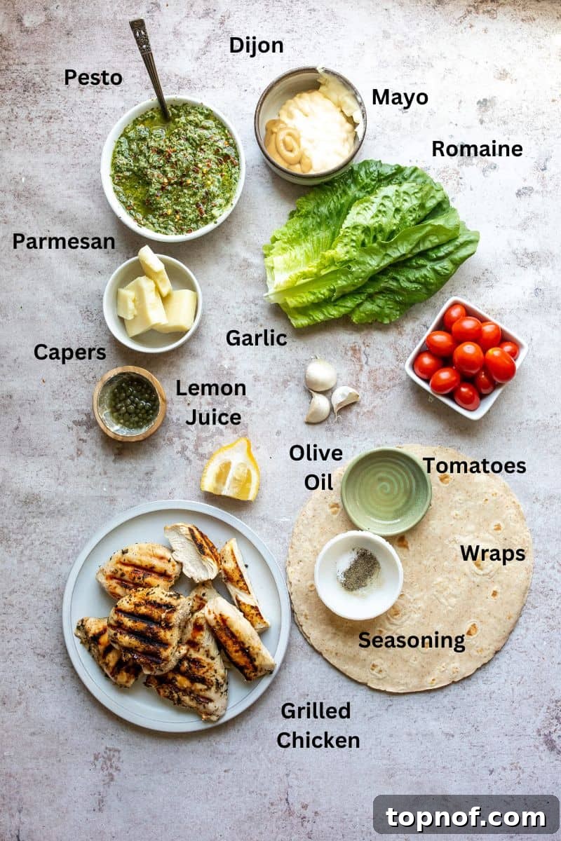 Vibrant Pesto Chicken Wraps 3 A selection of fresh ingredients neatly arranged in small bowls on a kitchen counter, showcasing the components needed to prepare delicious pesto chicken wraps.