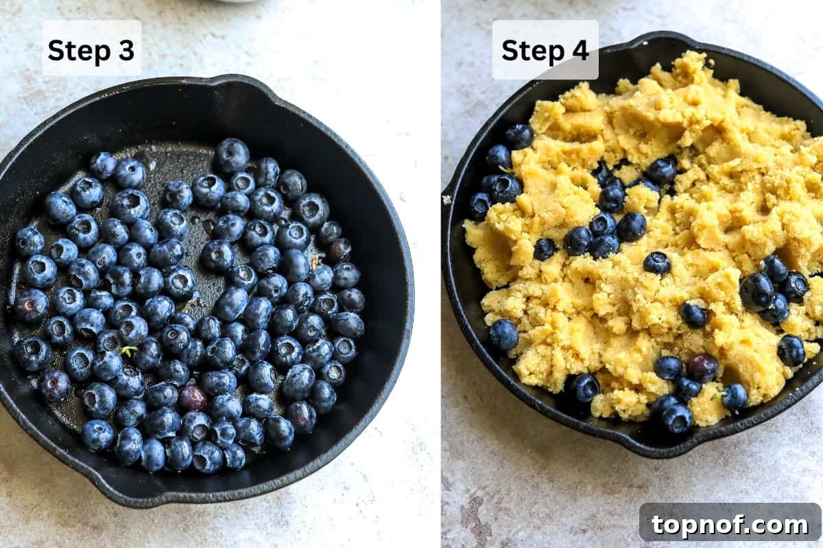 Luscious Gluten-Free Blueberry Cobbler 5 Fresh blueberries seasoned with lemon juice and zest at the bottom of a black cast iron skillet, ready for the cobbler topping.