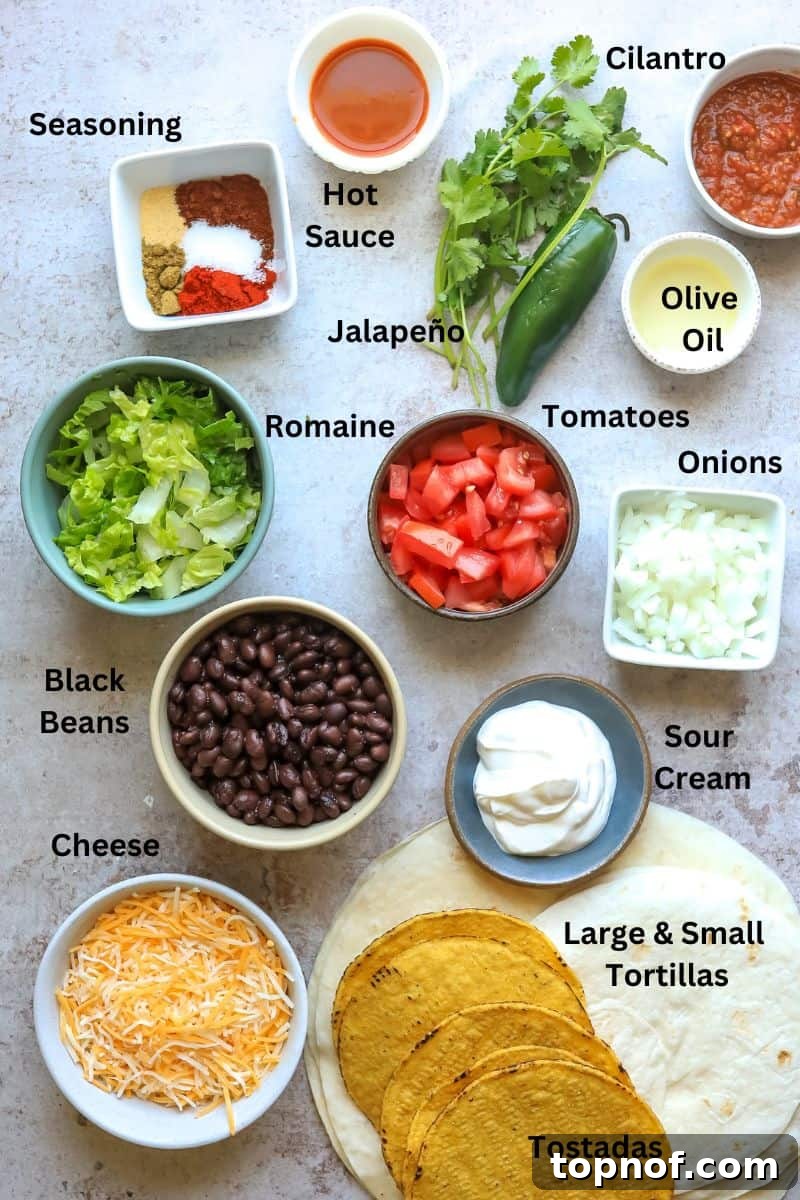 A collection of fresh ingredients laid out on a kitchen counter, ready for making the crunchwrap recipe.