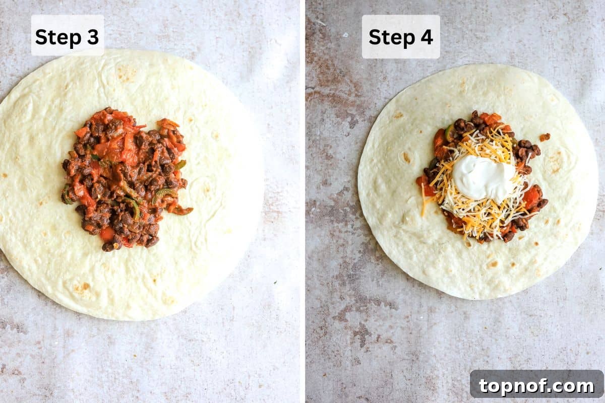 Layering the black bean mixture, cheese, and sour cream onto a large tortilla.