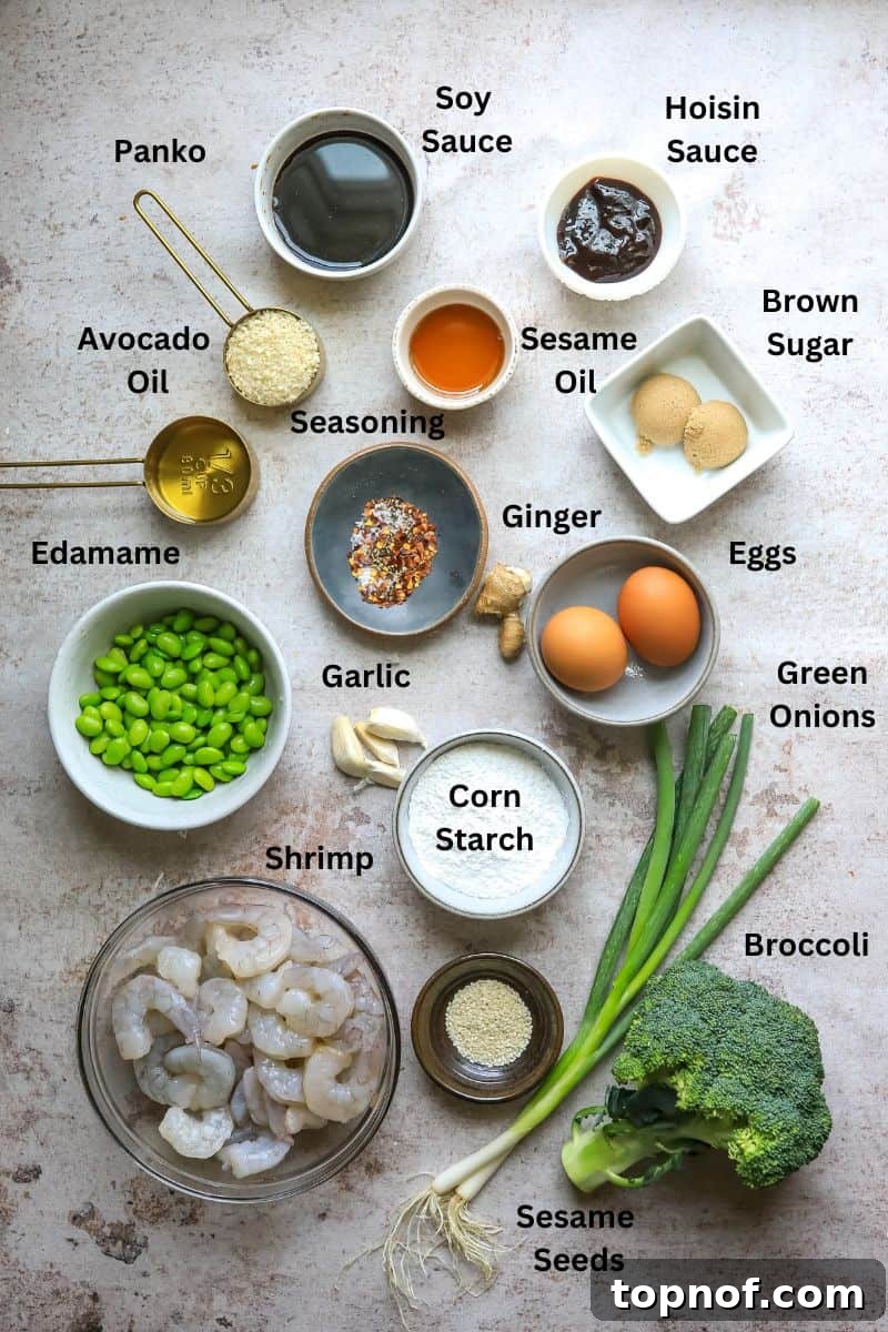Ingredients needed for the Mongolian shrimp on a counter in small bowls. 