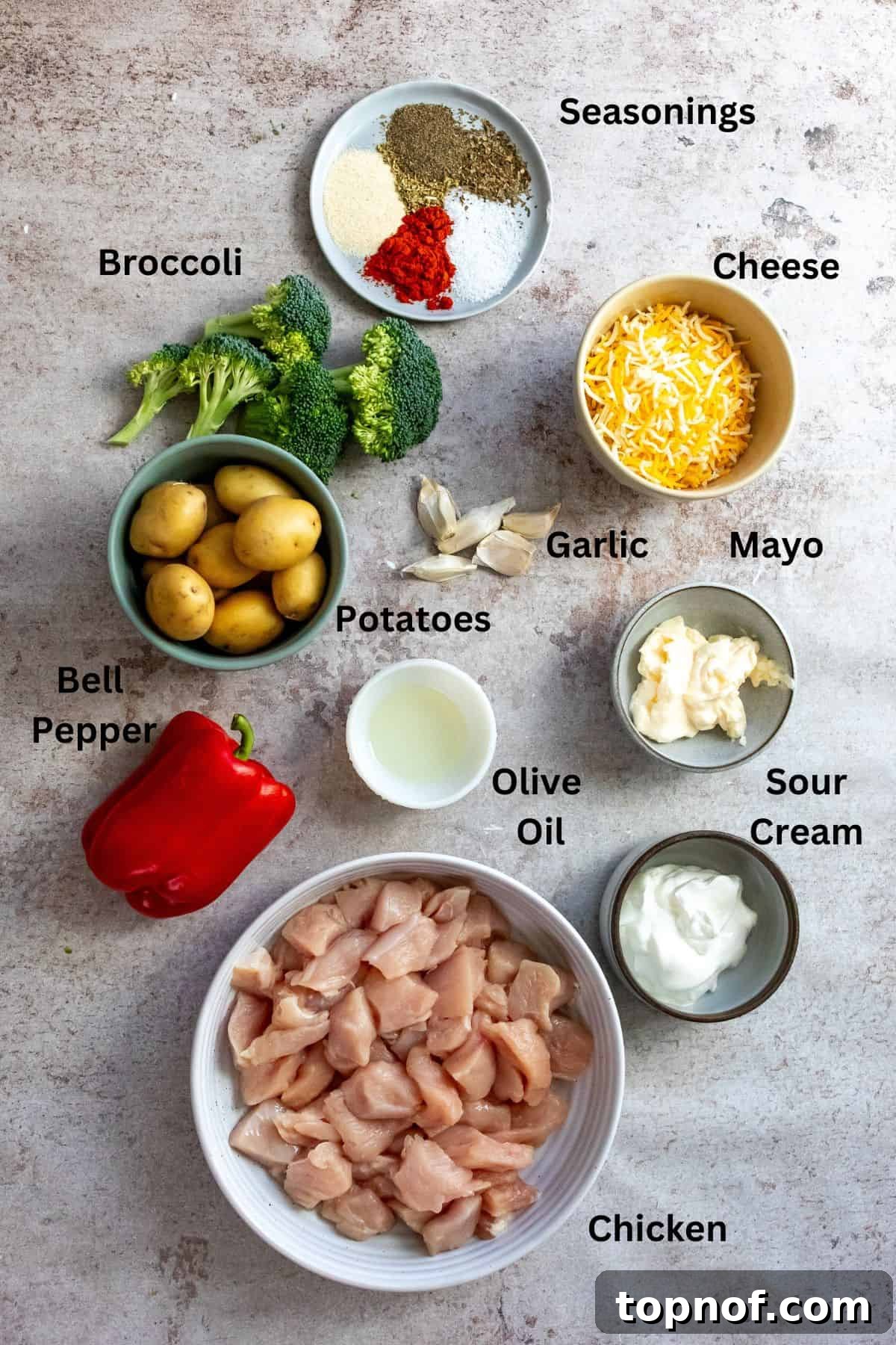 Hearty Chicken Broccoli Potato Bake 3 Ingredients needed to make Chicken Potato Broccoli Casserole on a counter in small bowls.