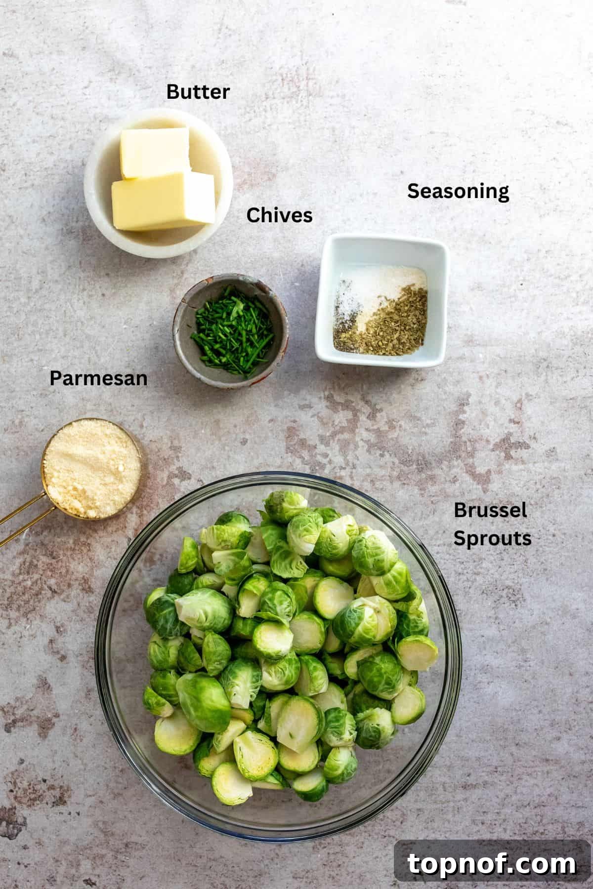 Crispy Parmesan Brussels Sprouts 3 Ingredients needed in small bowls and on a counter for Parmesan Crusted Brussels Sprouts recipe.