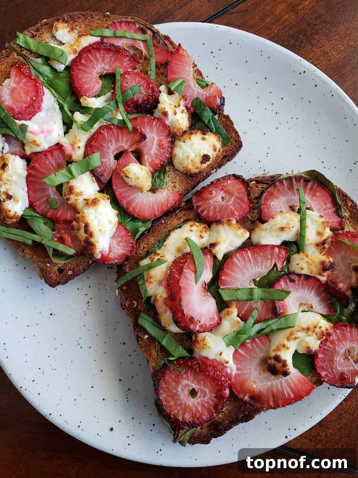Golden-brown Strawberry Goat Cheese Toast, elegantly prepared and ready to be served, highlighting fresh strawberries and creamy goat cheese.