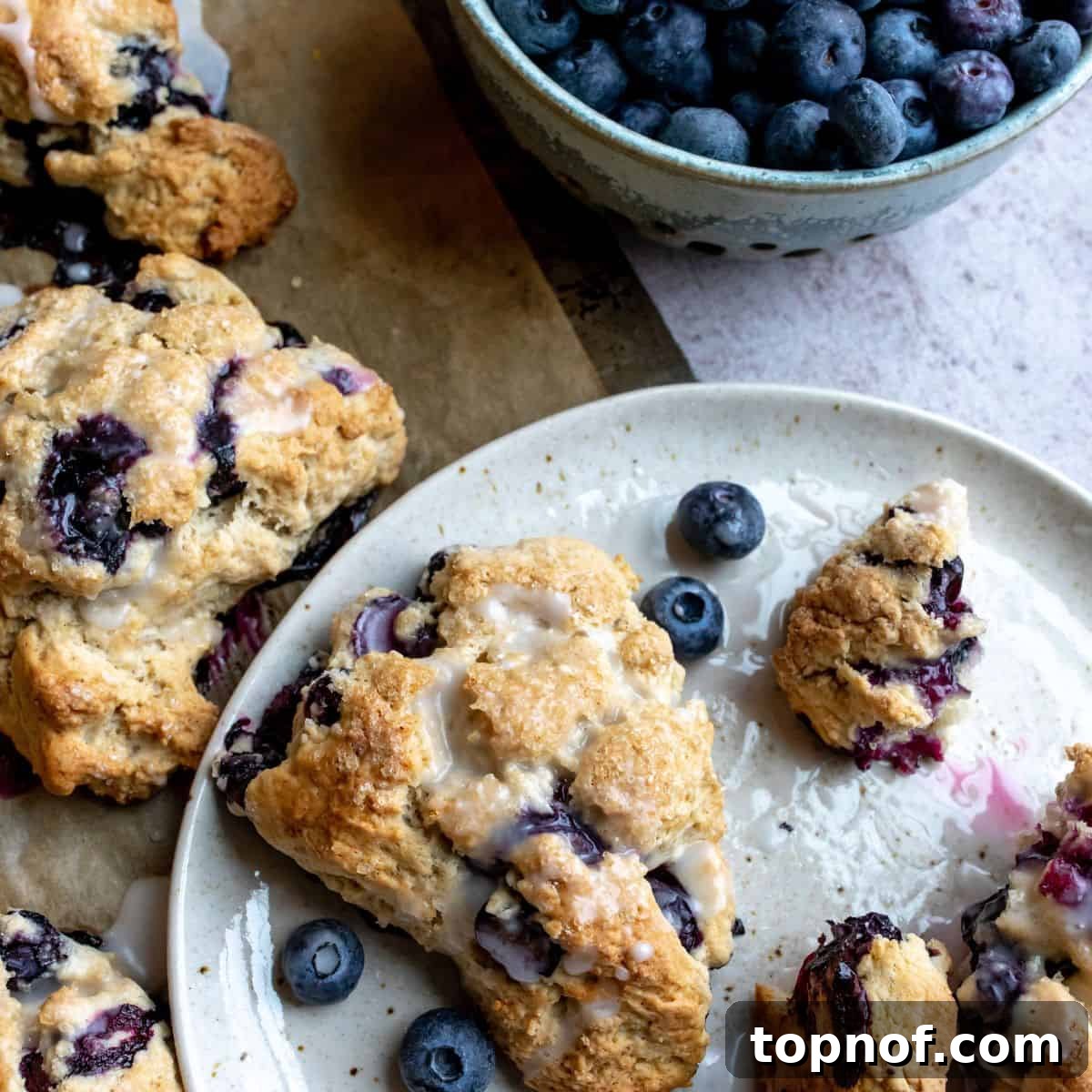 Perfectly baked Blueberry Cardamom Scones, featuring fragrant, citrusy cardamom and fresh blueberries, a delightful weekend treat.