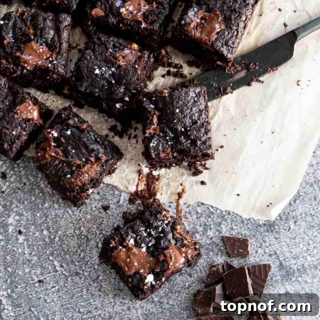 Gluten-Free Walnut Brownies A perfectly sliced Gluten-Free Walnut Brownie, ready to be served.