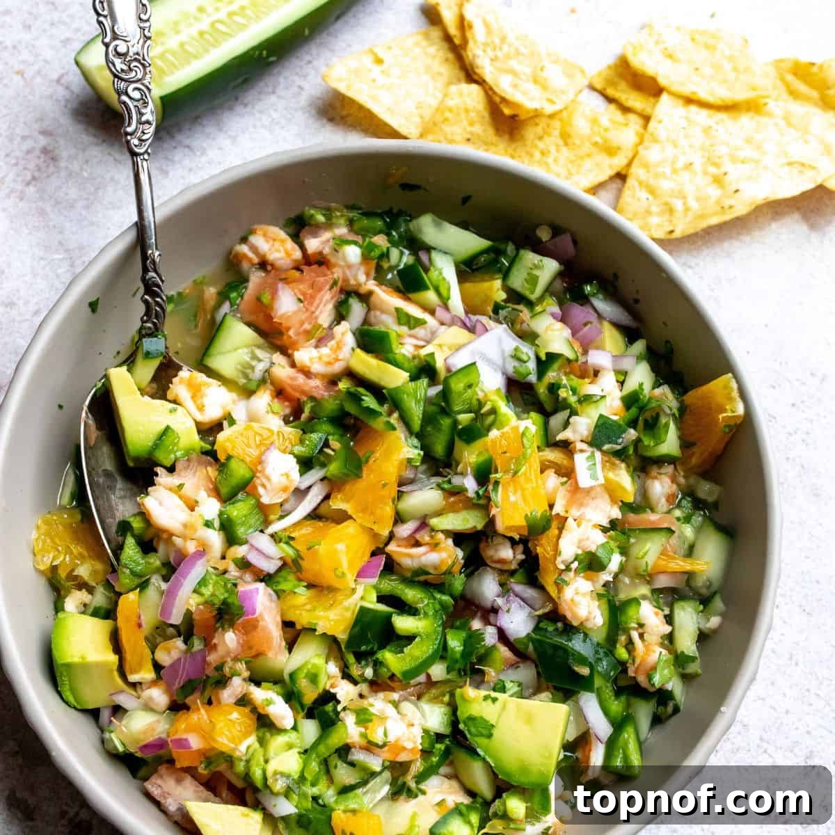 Fresh Mexican Shrimp Ceviche in a grey bowl, garnished with cilantro.
