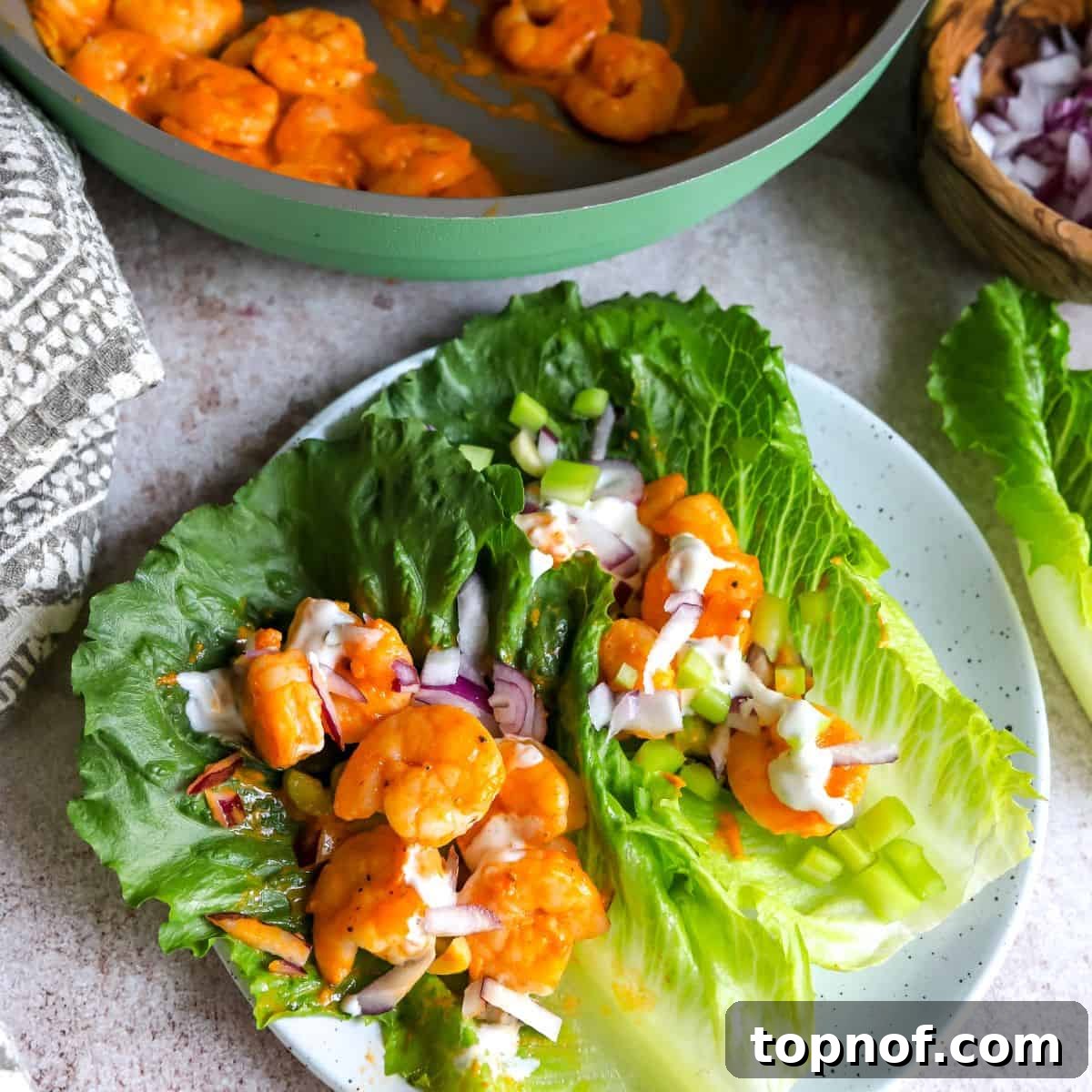 Flavorful Buffalo Shrimp Lettuce Wraps, light and spicy.