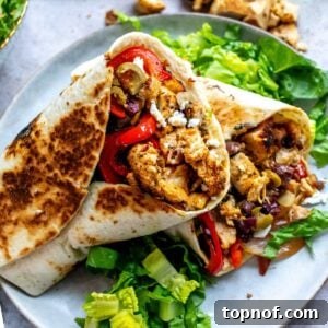 Mediterranean wraps on a plate with lettuce.