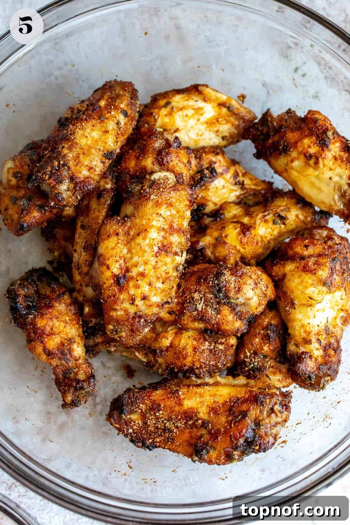 An overhead image of cooked dry rub wings, beautifully golden and crispy, ready to be served.