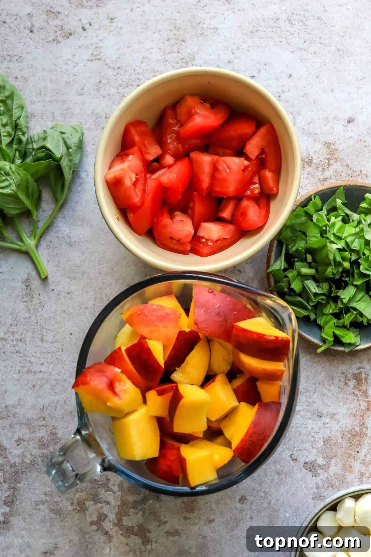 Small bowls with ingredients in them, neatly arranged for preparation.