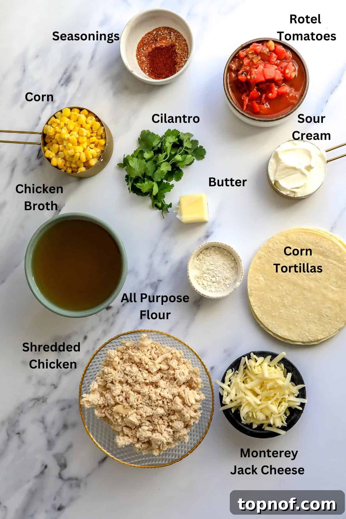 Creamy White Chicken Enchiladas 3 Ingredients needed to make this recipe on a counter in small bowls.