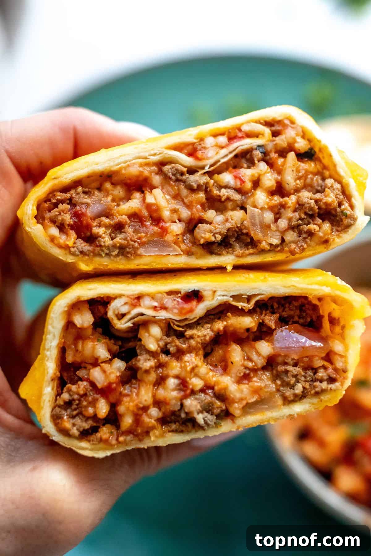 The Iconic Grilled Cheese Burrito Reimagined 5 A close-up view of two perfectly grilled cheese burritos held together, highlighting their golden-brown, crispy cheese crust.