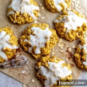Harvest Pumpkin Spice Delights 6 Pumpkin Pie Cookies on parchment paper with oats on the side.