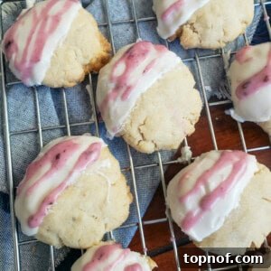 A perfectly baked vegan tea cookie with delicate icing on top, ready to be enjoyed.