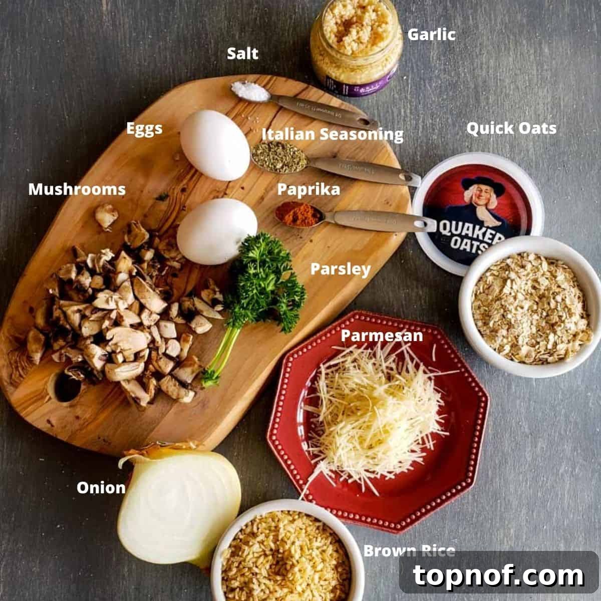 Wholesome Veggie Poppers 3 A selection of fresh ingredients laid out on a wooden cutting board, including uncooked brown rice, eggs, chopped mushrooms, fresh parsley, and a container of Quaker Quick Oats, ready for making vegetarian meatballs.