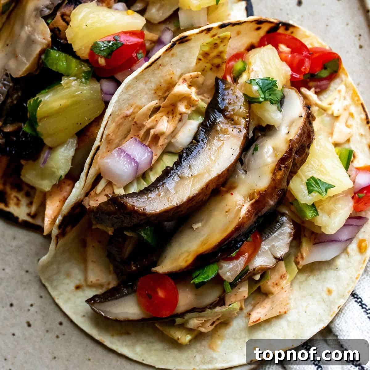 Umami Mushroom Asada Tacos 6 Finished Mushroom Asada Tacos beautifully arranged on a plate.