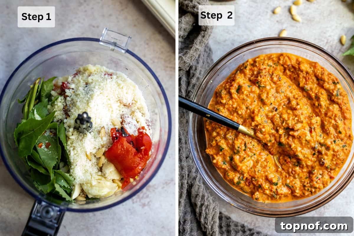 Roasted Red Pepper Pesto 4 A small food processor containing a blend of roasted red peppers, sun-dried tomatoes, basil, and pine nuts, half-blended, with a spoon nearby.