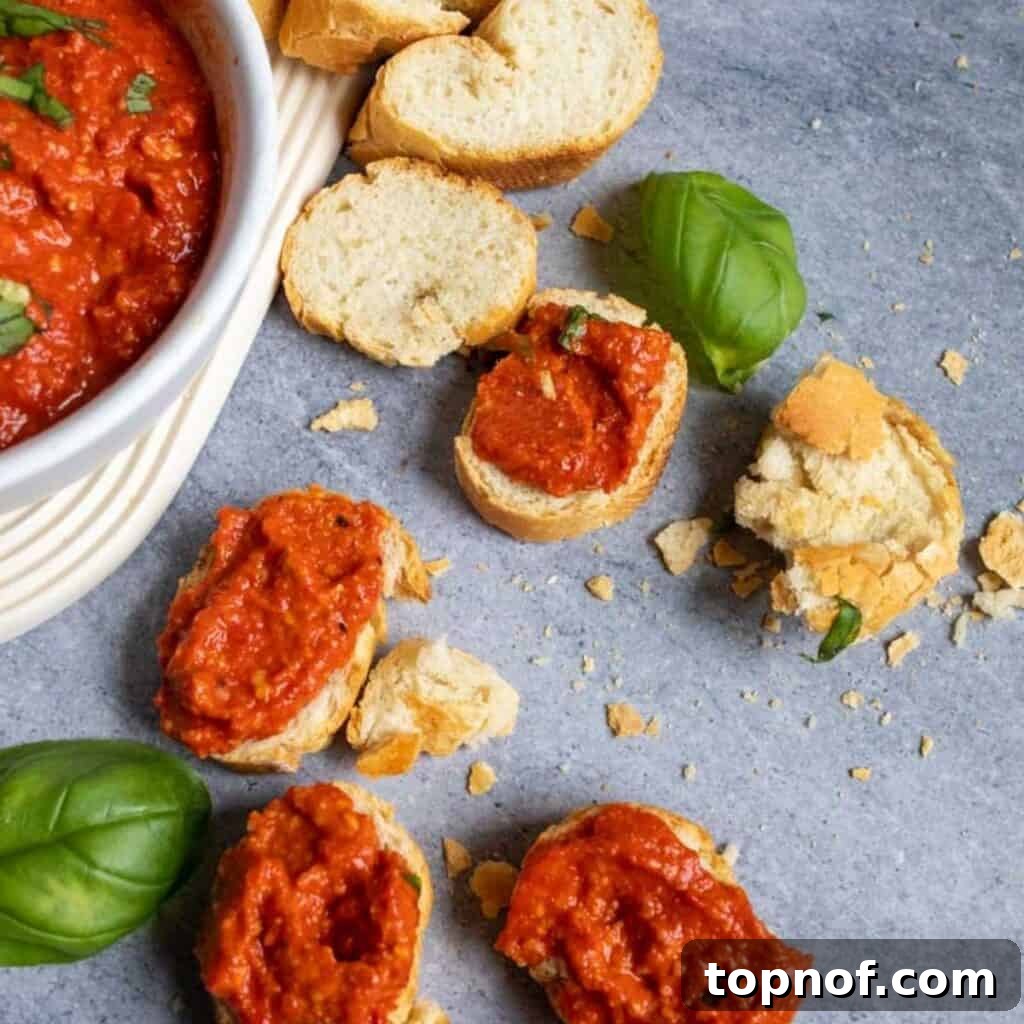 Simple Roasted Red Pepper Dip 6 Another enticing shot of the red pepper dip in a bowl, showcasing its rich color and inviting texture.
