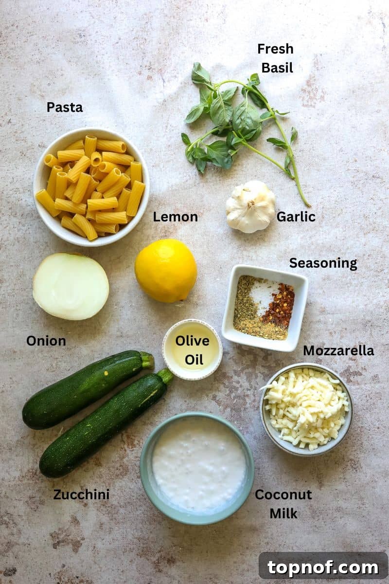 Zesty Pepper Lemon Pasta 3 A collection of fresh Lemon Pepper Pasta ingredients neatly arranged in small dishes and bowls on a kitchen counter, ready for preparation.