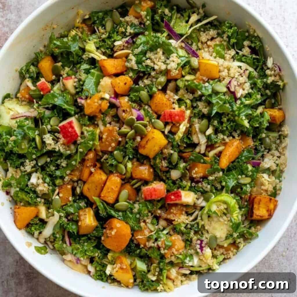 The Fall Harvest Salad assembled in a large white bowl, ready to be served.