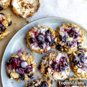 Blueberry oat cookies with icing on top.