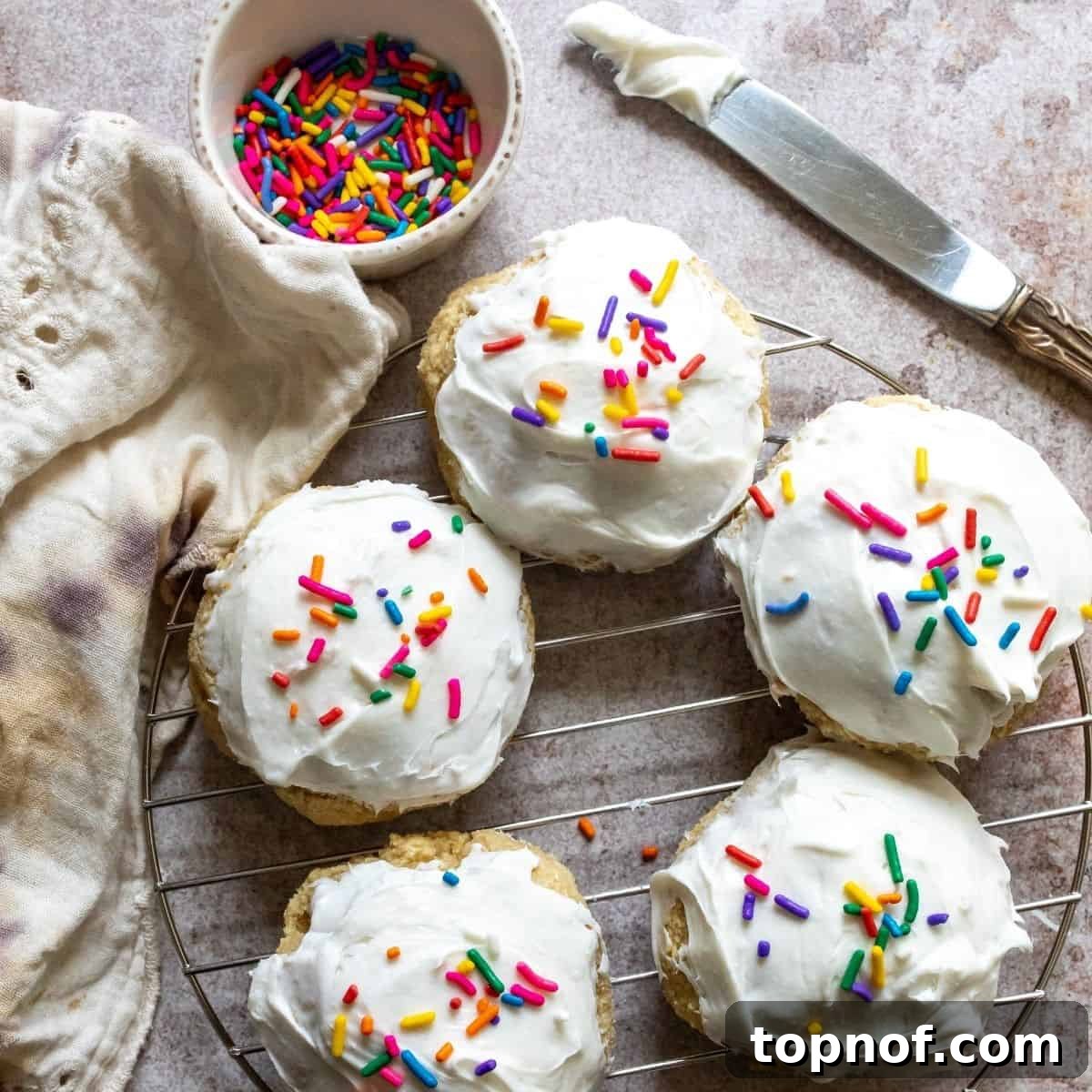 Tender Vegan Sugar Delights 5 Vegan Gluten Free Sugar Cookies up close on a cooling rack.