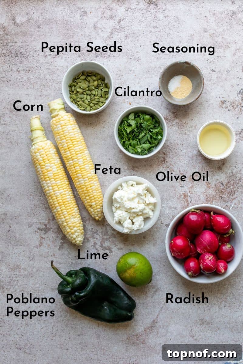 Charred Corn and Poblano Salad 3 Ingredients for Roasted Corn Salad with Poblano Pepper laid out on a grey kitchen counter.