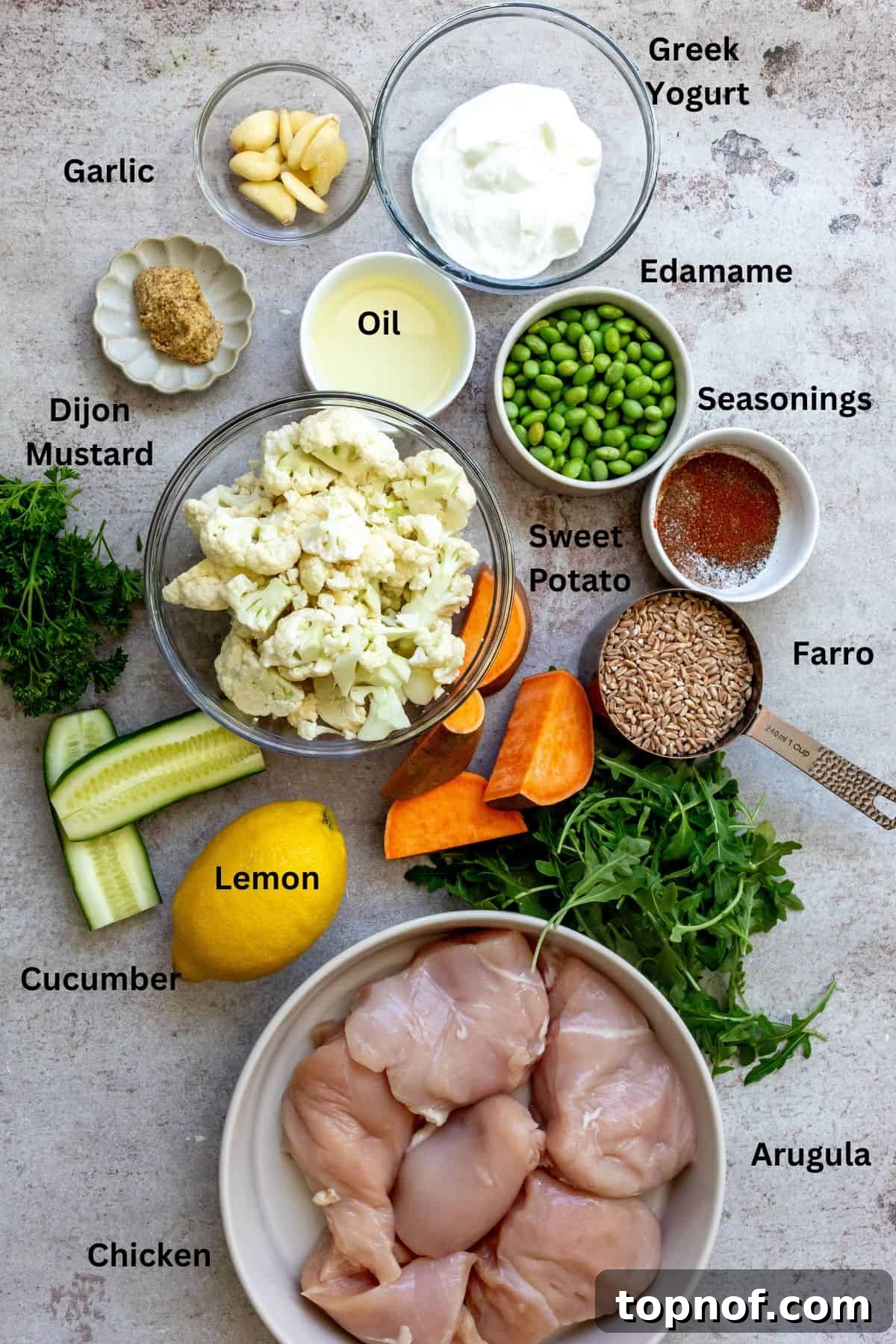 Lemon Garlic Chicken Grain Bowls with Roasted Veggies 3 Ingredients to make this dish on a counter all together and in bowls.