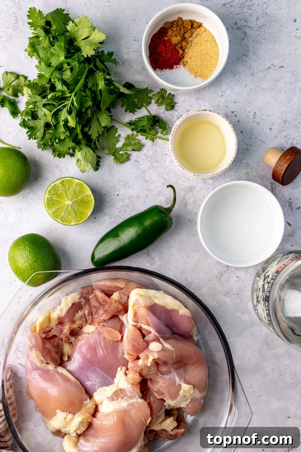Citrus Tequila-Lime Chicken Recipe for Grilled Weeknight Meals 3 Chicken and veggies on a counter top lined up neatly.
