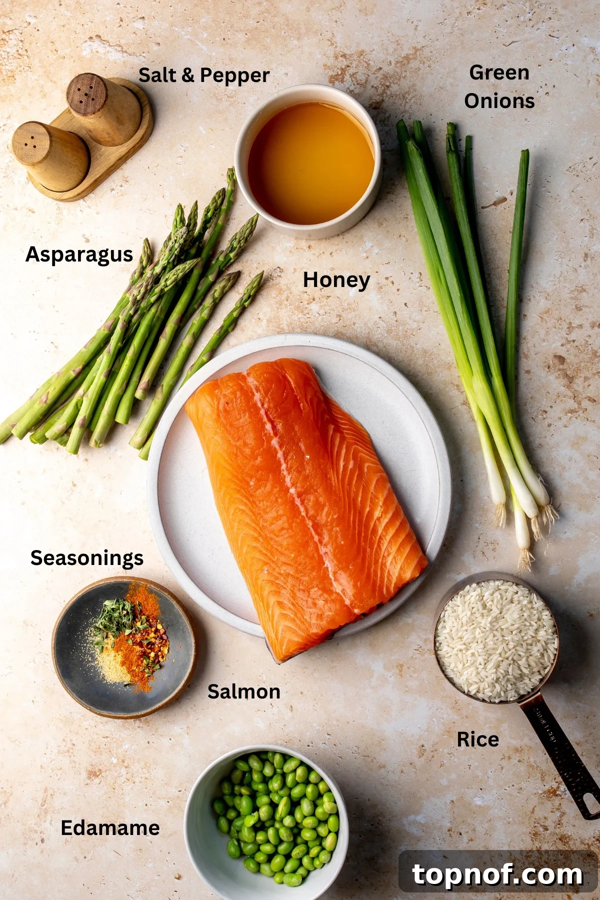 Hot Honey-Glazed Salmon with Crispy Skin 3 Ingredients needed to make this recipe on a countertop, measured out and lined up.